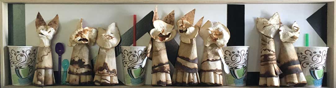 Coffee Cats made out of coffee filters and dried orange skins