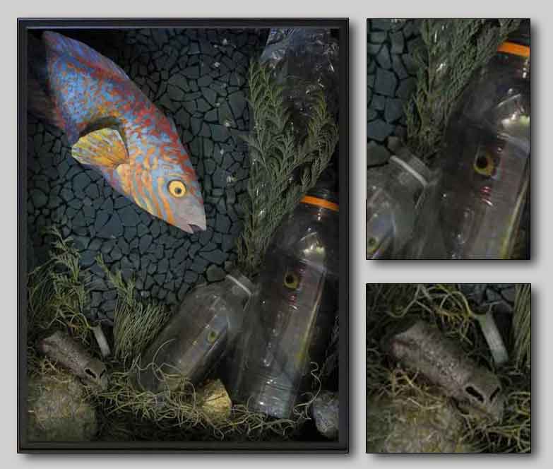 <em>&ldquo;My New Home Environment&rdquo;</em> 16x20 in, mixed media - &copy;2018 Maria Sky, All Rights Reserved <p>Shown at:  • 2018 Time and Tide Bell #200Fish, United Kingdom • 2019Public Alchemy Exhibition, Palo Alto, California, USA</p><p>A Rock Cook fish looks in disbelief oat its polluted environment - consisting of plastic bottles, small metal toy truck and a plastic cap that have been tossed haphazardly, by humans, into the ocean, not thinking of what this is doing to the ocean's environment. This combination of items shows the debris that have become common place in the Earth's oceans.</p>