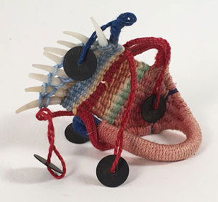  &ldquo;Red; 2x3 inches, mixed media - &copy;2001 Maria Sky, All Rights Reserved <p>Colorful hand woven mini-weaving with black flat beads and sea shells. It has no real meaning but reminded me a some of the wild and whimsical tiny creatures that inhabit earth.