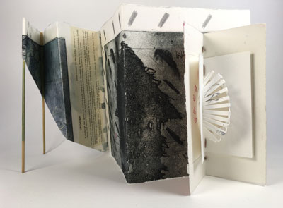 Front side of folded book on stilts