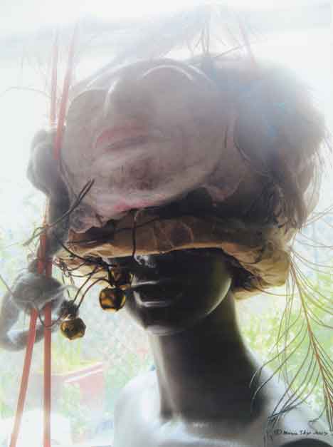  &ldquo;Headdress&rdquo; mixed media &copy;2007 Maria Sky, All Rights Reserved <p>This started with a large paper bag which was embellished with various materials, objects and peacock feathers.</p>